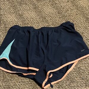 Nike Women's Dark Blue Athletic Shorts with Peach Trim